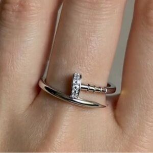 Elegant Silver Nail-Inspired Ring